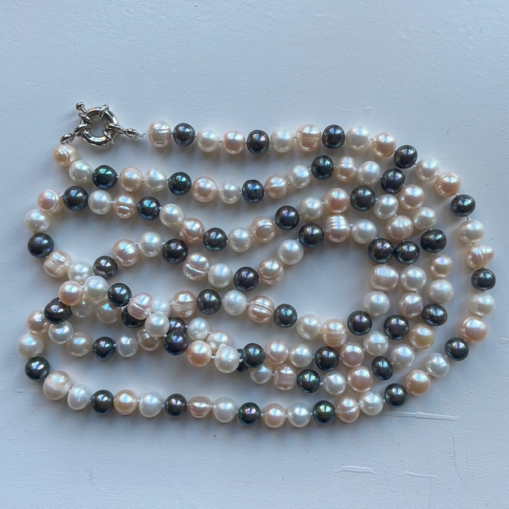 Genuine Freshwater Pearls. 48 inches.  Hand knotted.